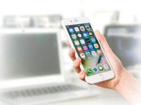 woman-holding-a-smartphone-3168797_1920..jpg